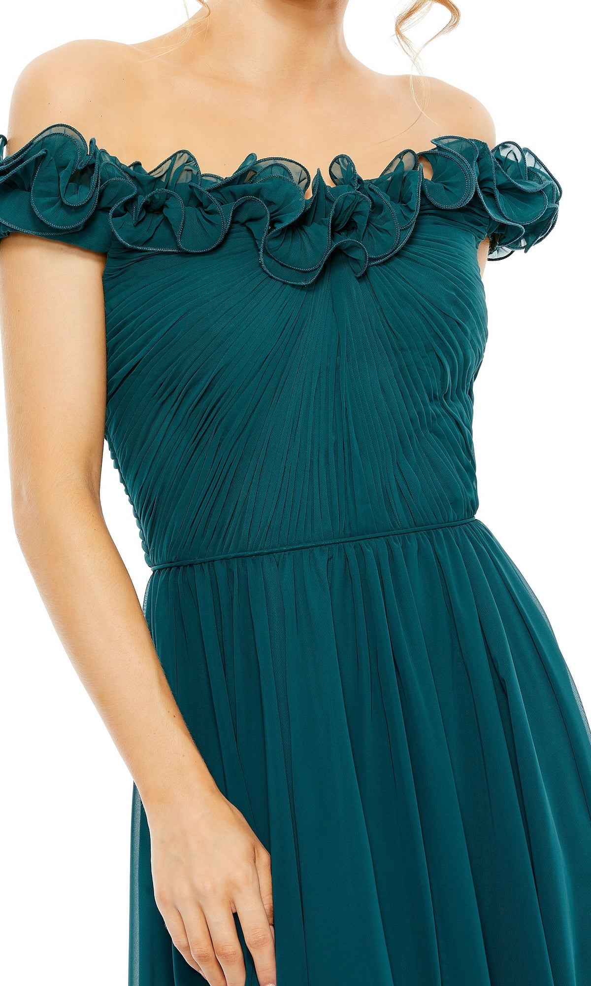 A woman wearing the Mac Duggal Long Formal Dress 11591, an off-the-shoulder, dark teal gown featuring a pleated skirt, ruched bodice, and ruffled neckline detailing.
